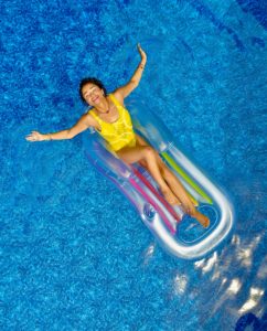 lady laying in pool float